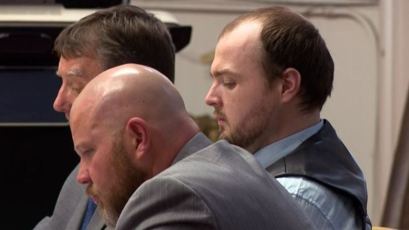 George Wagner IV is seen seated in the Pike County courtroom between his attorneys Oct. 3, 2022. Wagner faces charges of killing eight members of the Rhoden family in April 2016. CONTRIBUTED/WCPO