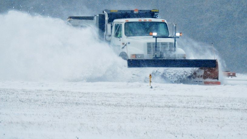 A city snow plow clears the runway at Middletown Regional Airport / Hook Field Monday, February 15, 2021 in Middletown. NICK GRAHAM / STAFF