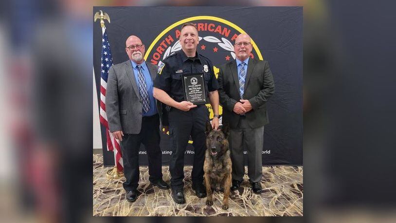 Dennis "Denny" Jordan, a Middletown police officer, and his K-9, Koda, received the Valor Award Thursday night at the North American Police Work Dog Association (NAPWDA) Conference in Broken Arrow, Okla. SUBMITTED PHOTO