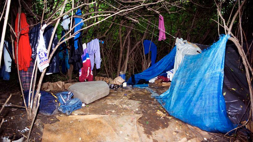 This file photo shows a camp of those experiencing homelessness, behind the Hamilton Plaza on Dixie Highway in Hamilton/Fairfield Twp. FILE
