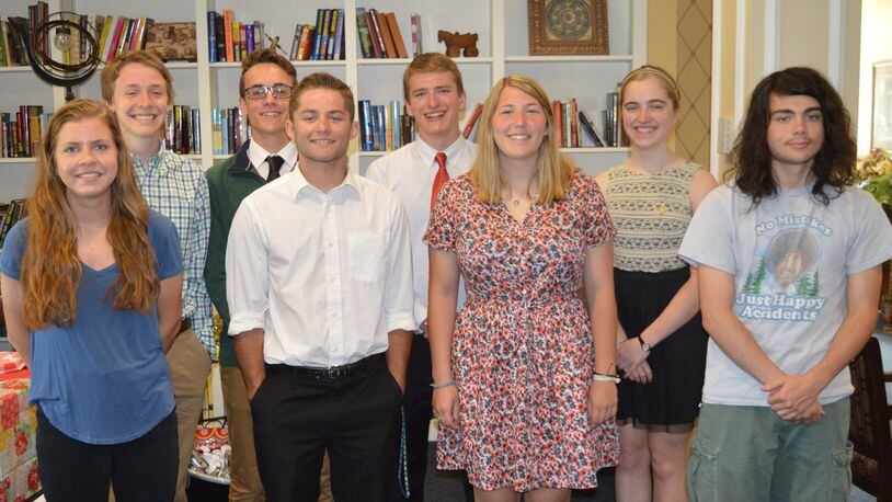 Eight graduating Talawanda High School seniors received $1,000 scholarships from the Oxford Rotary Club s Hefner Fund this year. Honored at a club lunch May 17, they are front row, from left, Beth Hansford, Cody Kiefer, Natalie Cobb and Elijah Frazier. Back row, Alex Bowie, Peter Whiteman, Adam Mandrell and Emily Froude. CONTRIBUTED/BOB RATTERMAN