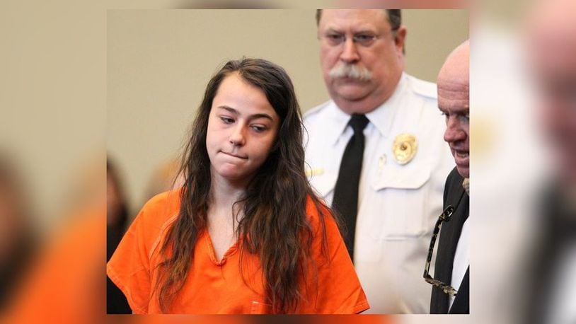 Misty Williams pleaded guilty to murder, aggravated robbery and aggravated burglary, for her part in the botched robbery and shooting death of Julian Slaven. She was sentenced Monday to 18 years to life in prison. FILE