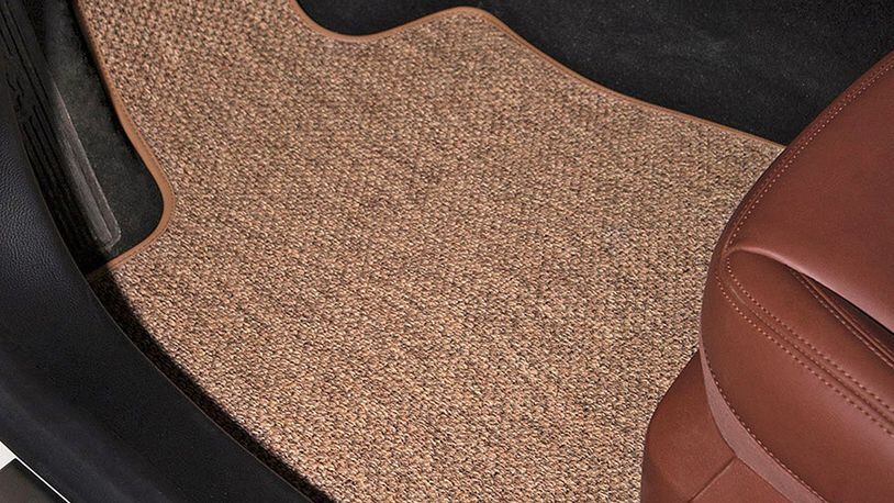 The GG Bailey All-Weather textile car floor mat shown in beige. They offer floor mats in a variety of styles and colors to fit almost any car, both new and classic. Photo from GG Bailey