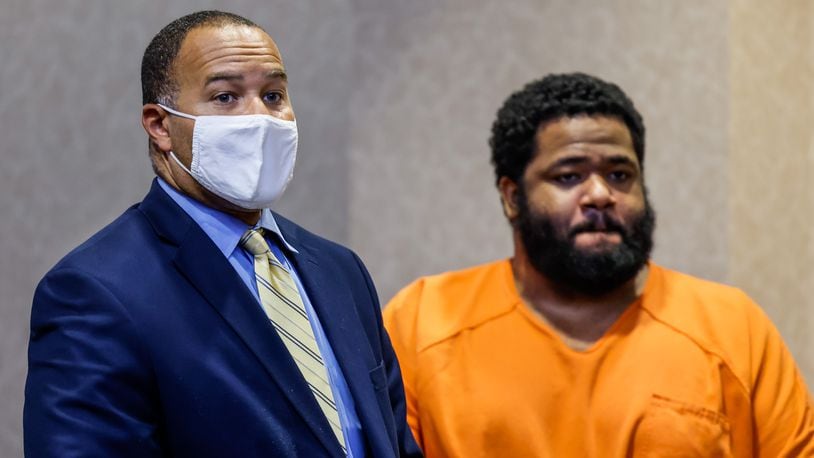 Mychel King, right, and his attorney Lawrence Hawkins III were in Butler County Common Pleas Court Thursday, Aug. 5, 2021 for a hearing in front of Judge Keith Spaeth. King is charged with aggravated murder in the 2016 shooting death of Jaylon Knight. NICK GRAHAM/STAFF