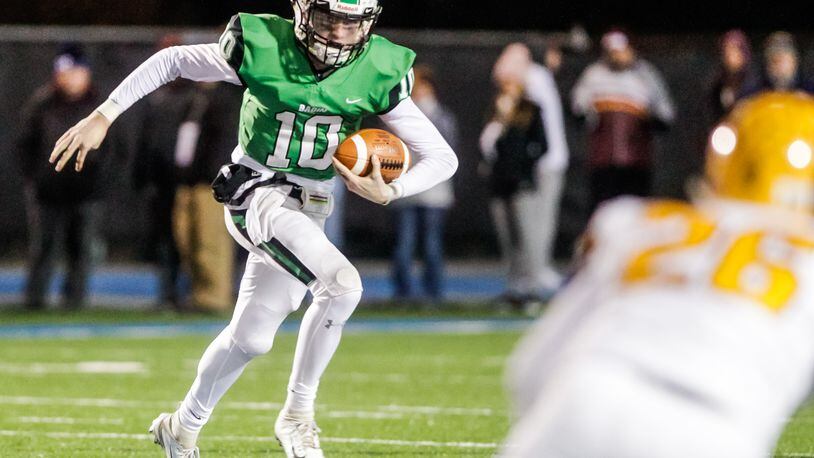 Badin’s Zach Switzer shown in action from earlier this season. Badin defeated Alter 38-21 Friday night in second-round playoff action. NICK GRAHAM/STAFF