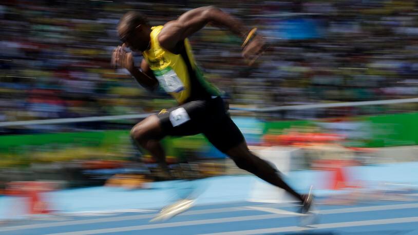 Jamaica's Usain Bolt competes in a men's 200-meter heat during the athletics competitions of the 2016 Summer Olympics at the Olympic stadium in Rio de Janeiro, Brazil, Tuesday, Aug. 16, 2016. (AP Photo/Charlie Riedel)