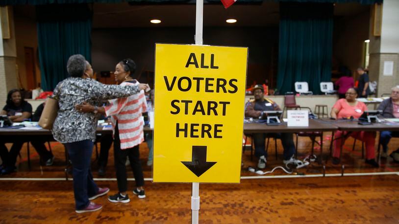 Ohio voters headed to the polls Tuesday, including Precious Blood School in Trotwood, to cast their ballots in local and statewide primary races. LISA POWELL / STAFF