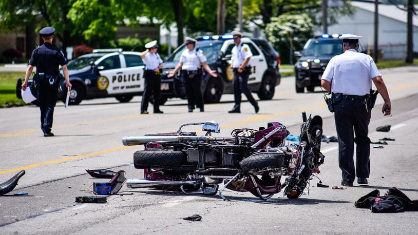 A medical helicopter was called for a crash between a car and a motorcycle Tuesday afternoon, May 7 at Fairgrove Avenue (Ohio 4) and Campbell Drive in Hamilton. Hamilton police and the Butler County Serious Traffic Accident Reconstruction Team was on the scene investigating and used of a drone for aerial images. NICK GRAHAM/STAFF