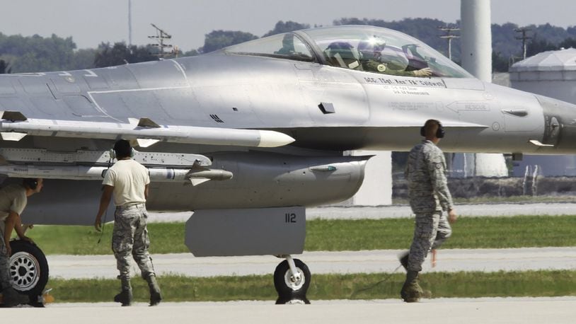 F-16 crews from the Ohio Air National Guard’s 180th Fighter Wing flew training missions out of Wright-Patterson Air Force Base in 2013, as their home runway at Toledo Express Airport is repaved. CHRIS STEWART / STAFF FILE PHOTO