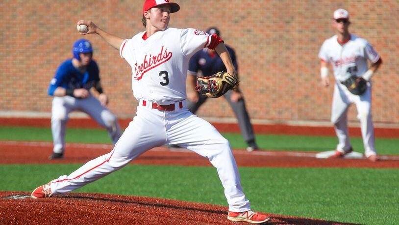 Lakota West pitcher Max Kiker (3) deals to the plate during a Division I regional final against St. Xavier at the University of Cincinnati’s Marge Schott Stadium on May 26, 2017. GREG LYNCH/STAFF