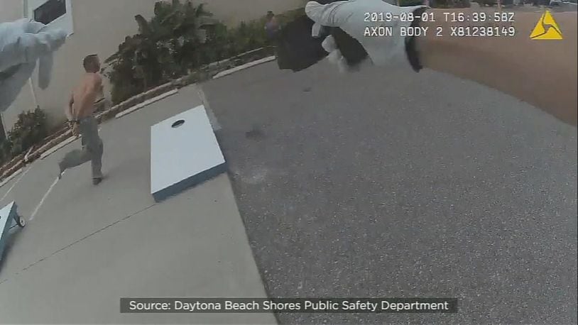 A man in Volusia County tried to run from police with his hands cuffed behind his back, body camera video shows. A man in Volusia County tried to run from police with his hands cuffed behind his back, body camera video shows. (Photo: Daytona Beach Shores Public Safety Department)