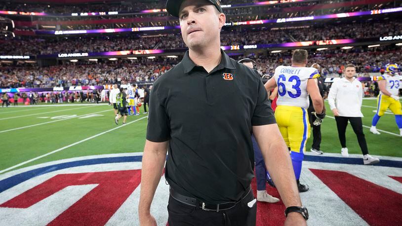 Cincinnati Bengals head coach Zac Taylor walks off the field after the Bengals were defeated by the Los Angeles Rams in the NFL Super Bowl 56 football game Sunday, Feb. 13, 2022, in Inglewood, Calif. (AP Photo/Lynne Sladky)