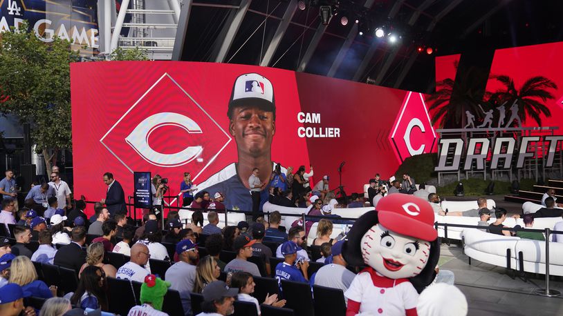 Cam Collier is selected by the Cincinnati Reds with the 18th pick of the 2022 MLB baseball draft, Sunday, July 17, 2022, in Los Angeles. (AP Photo/Jae C. Hong)