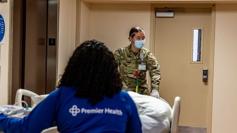 Members of the Ohio National Guard are helping at Miami Valley Hospital in Dayton as Ohio experiences staffing shortages at hospitals across the state during the COVID-19 pandemic. Guard members arrived on Dec. 30, 2021, for orientation and have been assisting with food service, environmental services, patient transport and other non-clinical jobs. The National Guard is also helping with Premier Health’s COVID testing site located across from MVH on Main Street. Photo courtesy Premier Health