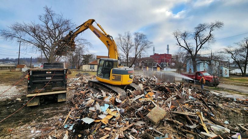 A home on North Second Street in Hamilton's North End was razed on Monday, Feb. 6, 2023. This house was next to the former Speedy's Drive-Thru. Buildings on properties along North Second and North Third streets will be demolished over the next few weeks. NICK GRAHAM/STAFF