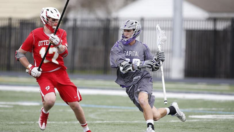 Capital University junior Brennan O’Callaghan, shown in action against Otterbein, leads his team with 30 goals and nine assists this season. CONTRIBUTED PHOTO BY BEN BARNES