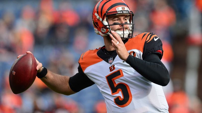 DENVER, CO - NOVEMBER 19: Quarterback AJ McCarron #5 of the Cincinnati Bengals throws as he warms up before a game against the Denver Broncos at Sports Authority Field at Mile High on November 19, 2017 in Denver, Colorado. (Photo by Dustin Bradford/Getty Images)