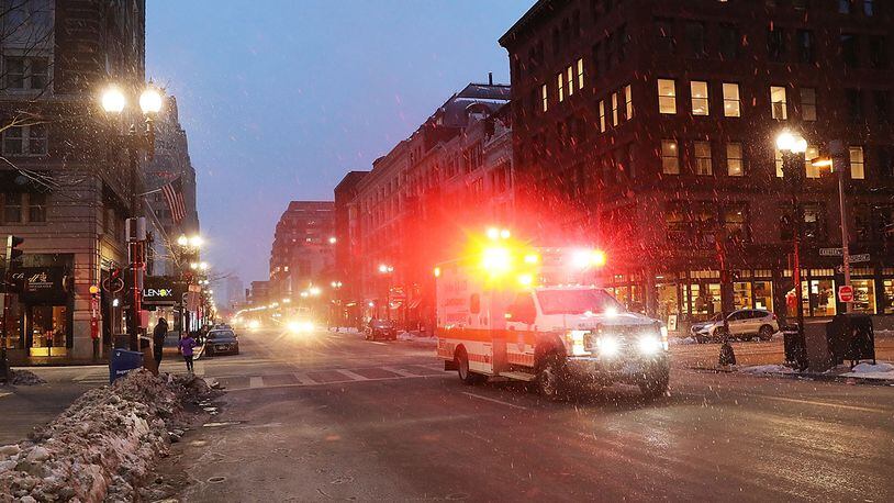 An ambulance drives through the empty streets of Boston (File photo by Spencer Platt/Getty Images)