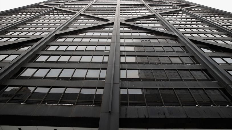 An elevator plunged 84 floors after a cable broke Friday at the former John Hancock Center in Chicago.