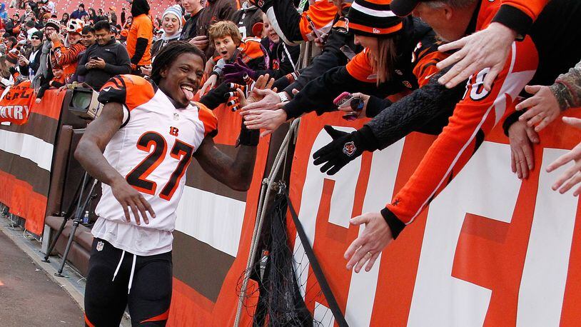 CLEVELAND, OH - DECEMBER 6: Dre Kirkpatrick #27 of the Cincinnati Bengals celebrates a 37-3 win over the Cleveland Browns with fans at FirstEnergy Stadium on December 6, 2015 in Cleveland, Ohio. Bengals won the game 37-3. (Photo by Gregory Shamus/Getty Images)