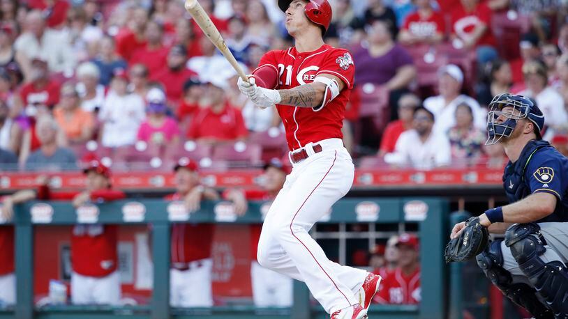 CINCINNATI, OH - JUNE 30: Michael Lorenzen #21 of the Cincinnati Reds hits a grand slam home run while pinch hitting in the seventh inning against the Milwaukee Brewers at Great American Ball Park on June 30, 2018 in Cincinnati, Ohio. (Photo by Joe Robbins/Getty Images)