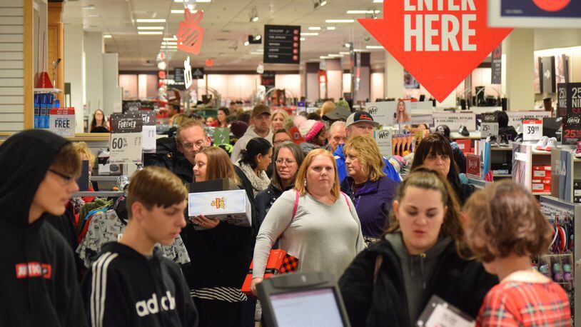 JCPenney opened at 2 p.m. Thanksgiving to more than 800 shoppers looking for a coupon and doorbusters. STAFF PHOTO / HOLLY SHIVELY