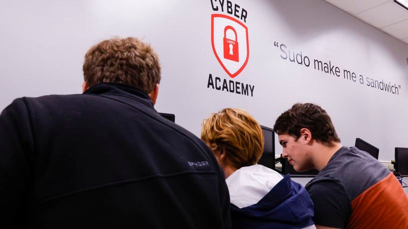 Two of the region’s most advanced high school Cyber Academies were just ranked among the best in the nation and both can be found at Lakota’s high schools. The new rankings, which are based on recent cyber security competition also including college and professional cyber technicians in the cyber industry, marks the latest honors for the Lakota East and Lakota West high school programs. Pictured are academy students from last school year. (File Photo\Journal-News)