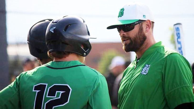 Badin coach Brion Treadway talks to Alex Barger (12) during Tuesday’s Division I district baseball semifinal against La Salle at Lakota East. Badin won 2-1. PHOTO BY TERRI ADAMS PHOTOGRAPHY
