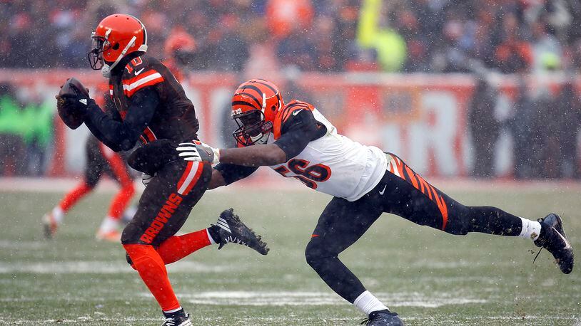 CLEVELAND, OH - DECEMBER 11: Karlos Dansby #56 of the Cincinnati Bengals tackles Robert Griffin III #10 of the Cleveland Browns at Cleveland Browns Stadium on December 11, 2016 in Cleveland, Ohio. (Photo by Justin K. Aller/Getty Images)