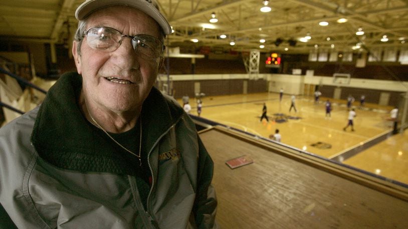 Jack Gordon, of WPFB radio in Middletown, the longtime radio voice of Middletown High School football and basketball, is pictured at Wade E. Miller Gym in Middletown in 2009. Gordon died Saturday, Jan. 28, at the age of 85. STAFF FILE/2009