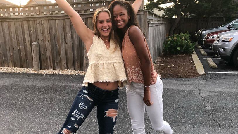 Kasey Hughes  (left), who played basketball at Baldwin Wallace, and Cameron Campbell (right), a track athlete at Wright State, became friends as 8-year-old soccer teammates and continued their bond through Springboro High School and now as recent college graduates. The pair miraculously survived the Oregon District mass shooting last Aug. 4 . CONTRIBUTED