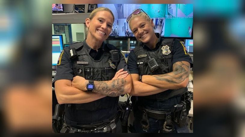 Middletown Police Officers Sheoki Reece and Jamie Patterson may show their tattoos while they are on duty. CONTRIBUTED/MIDDLETOWN POLICE DEPT.