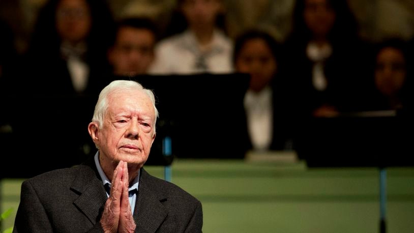 Former President Jimmy Carter teaches Sunday School class at Maranatha Baptist Church in his hometown of Plains, Ga. It was Carter’s first lesson since detailing the intravenous drug doses and radiation treatment planned to treat melanoma found in his brain after surgery to remove a tumor from his liver. (AP Photo/David Goldman, File)