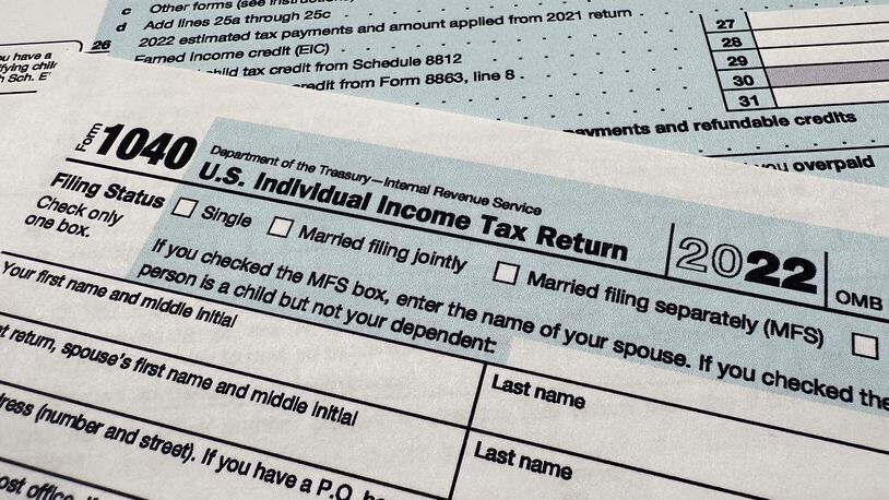 FILE - The Internal Revenue Service 1040 tax form for 2022 is seen on April 17, 2023. The IRS said Friday, April 26, 2024, more than 140,000 taxpayers filed their taxes through its new direct file pilot program. It says the program's users claimed more than $90 million in refunds, saving roughly $5.6 million in fees they would have spent with commercial tax preparation companies. (AP Photo/Jon Elswick, File)