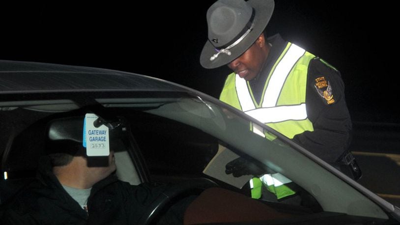 Police on a saturation patrol around the area where an OVI checkpoint was operating on Saturday in Hamilton arrested a driver on four charges.