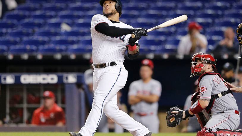 MIAMI, FLORIDA - AUGUST 29:  Harold Ramirez #47 of the Miami Marlins hits a solo walk-off home run in the twelfth inning against the Cincinnati Reds at Marlins Park on August 29, 2019 in Miami, Florida. (Photo by Michael Reaves/Getty Images)