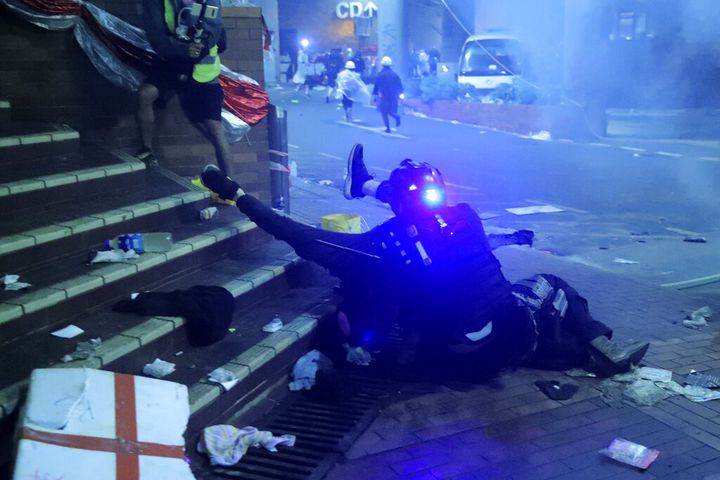 Photos: Police use tear gas to drive back protesters barricaded in Hong Kong university