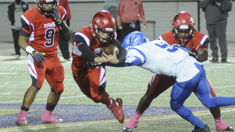 Trotwood QB Markell Stephens-Peppers threw for four TDs and ran for another. Trotwood-Madison defeated Dunbar 64-26 in a D-III, Region 12 high school football playoff semifinal at Butler on Friday, Nov. 10, 2017. MARC PENDLETON / STAFF