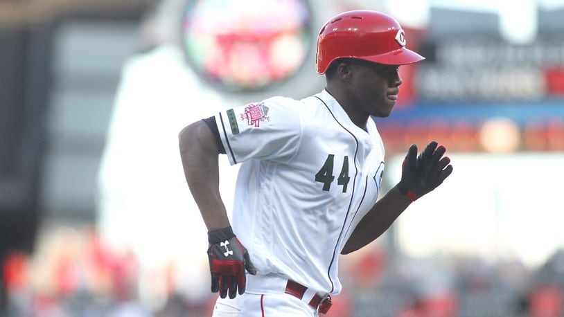 Aristides Aquino rounds the bases after a home run against the Cubs on Aug. 9, 2019, at Great American Ball Park in Cincinnati.