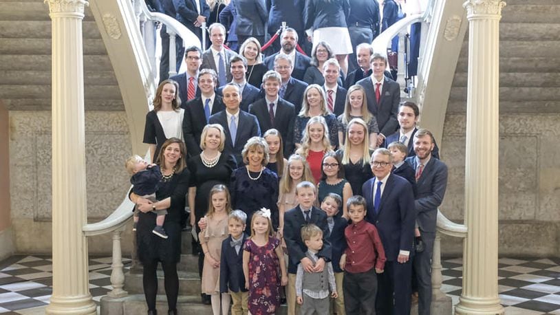 Ohio Gov. Mike DeWine, first lady Fran DeWine and their family at the inauguration on Monday.