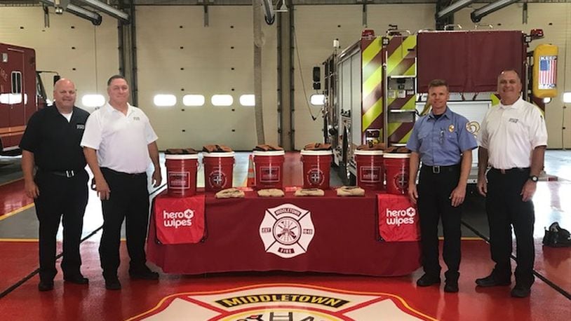 From left, Capt. Jon Harvey, Chief Paul Lolli, Deputy Chief David Adams and Assistant Chief Thomas Snively stand with some of the items the Middletown Division of Fire received from a Firehouse Subs grant. SUBMITTED PHOTO