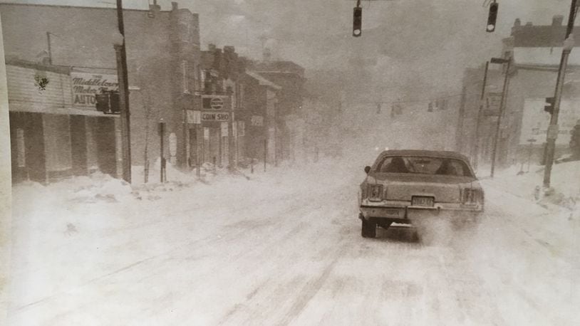 A car travels through the snow in Middletown in January, 1978. JOURNAL-NEWS ARCHIVE PHOTOS