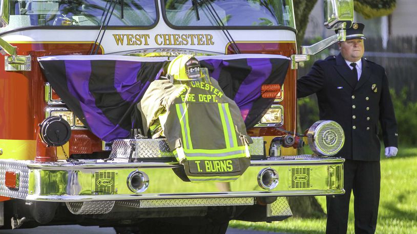 A funeral service for longtime West Chester Twp. firefighter Tim Burns, who died May 17 after a battle with occupational renal cancer, was held at Springdale Church of the Nazarene, Tuesday, May 23, 2017. A procession of fire apparatus honored Firefighter Burns on his final ride. GREG LYNCH / STAFF