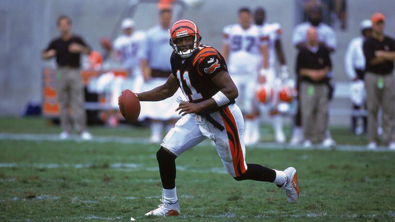 10 Sep 2000: Akili Smith #11 of the Cincinnati Bengals runs with the ball during the game against the Cleveland Browns at the Paul Brown Stadium in Cincinnati, Ohio. The Browns defeated the Bengals 24-7.Mandatory Credit: Jonathan Daniel /Allsport