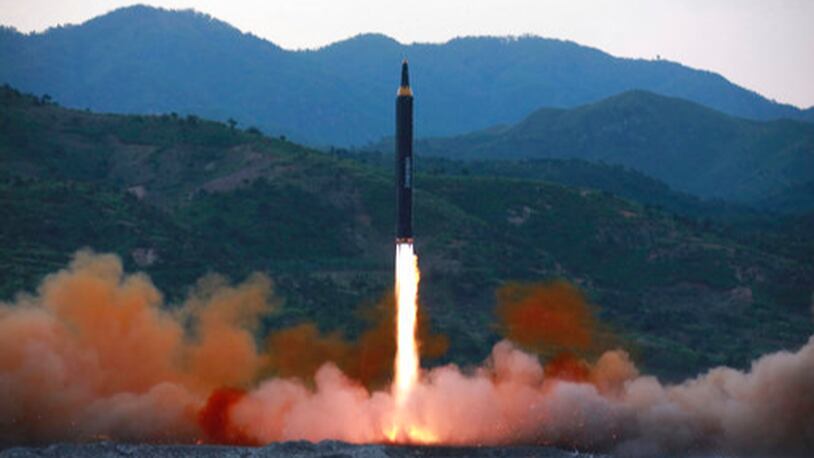 This May 14, 2017, photo distributed by the North Korean government shows the  "Hwasong-12," a new type of ballistic missile at an undisclosed location in North Korea. North Korea on Monday, May 15, 2017, boasted of a successful weekend launch of a new type of "medium long-range" ballistic rocket that can carry a nuclear warhead. Outsiders also saw a significant technological jump, with the test-fire apparently flying higher and for a longer time period than any other such previous missile. Independent journalists were not given access to cover the event depicted in this photo. (Korean Central News Agency/Korea News Service via AP)