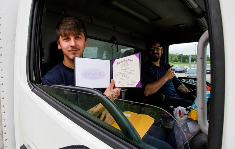 Middletown High School graduates drive up to receive diplomas