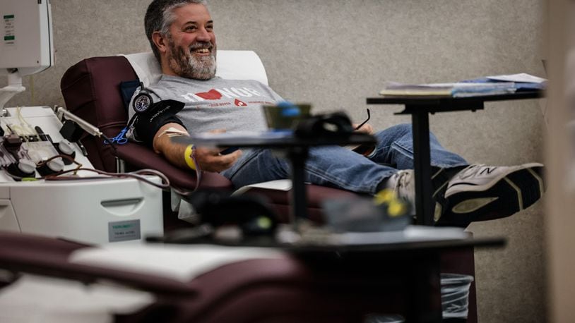 Stephen Grusenmeyer, from Tipp City, donates platelets at the Solvita Blood Center in Dayton on Tuesday January 9, 2024. The Dayton region is in critical need of certain blood types. JIM NOELKER/STAFF