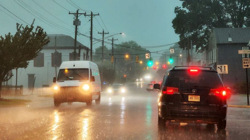 FILE PHOTO: Storms with heavy rain and strong winds caused power outages and down trees and limbs around Butler County Monday evening, June 13, 2022. This is in Trenton while storms blew through. NICK GRAHAM/STAFF