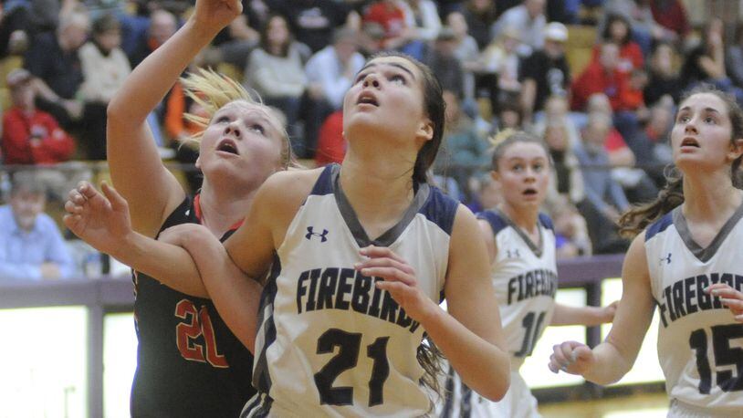 Tecumseh’s Macy Berner (left) and Fairmont’s Madeline Westbeld position for a rebound. Tecumseh defeated Fairmont 54-45 and will play Beavercreek in a D-I girls high school basketball sectional final at 1 p.m. Saturday, Feb. 25, 2017 at Vandalia-Butler. MARC PENDLETON / STAFF
