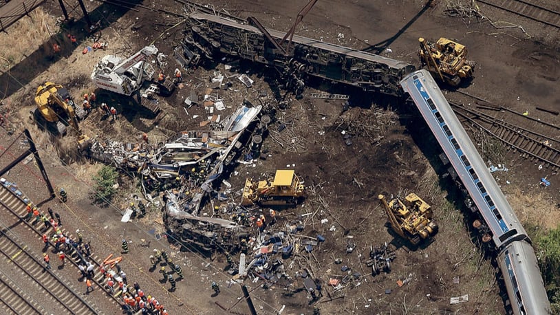 PHILADELPHIA, PA - MAY 13:  Investigators and first responders work near the wreckage of Amtrak Northeast Regional Train 188, from Washington to New York, that derailed yesterday May 13, 2015 in north Philadelphia, Pennsylvania. At least six people were killed and more than 200 others were injured in the crash.  (Photo by Win McNamee/Getty Images)